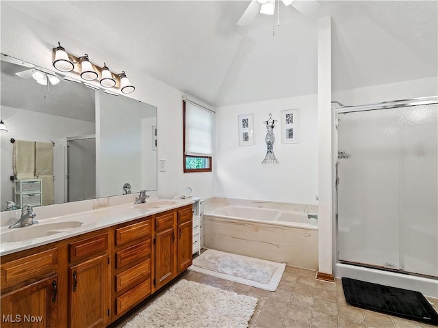 21428 Montclare Blvd, Strongsville, OH 44149 - full bath with a ceiling fan, a shower stall, double vanity, a bath, and lofted ceiling