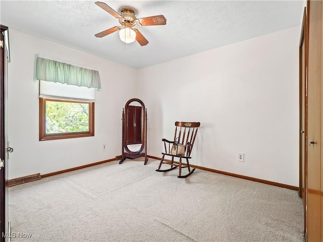 21428 Montclare Blvd, Strongsville, OH 44149 - unfurnished room with carpet flooring, a ceiling fan, baseboards, and a textured ceiling