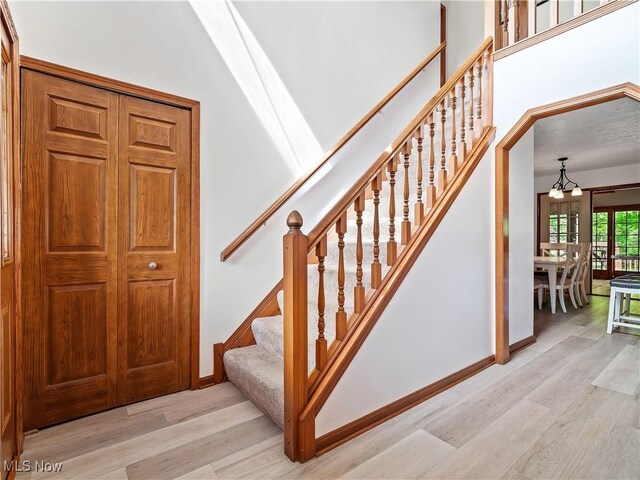 21428 Montclare Blvd, Strongsville, OH 44149 - staircase featuring wood finished floors and baseboards