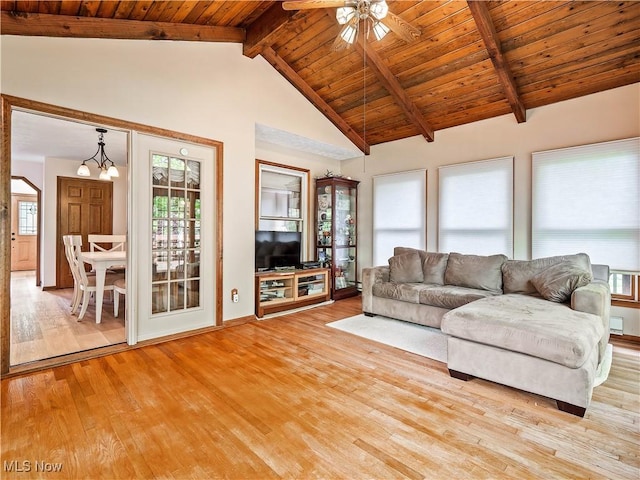 21428 Montclare Blvd, Strongsville, OH 44149 - living area with light wood finished floors, wooden ceiling, beam ceiling, ceiling fan, and high vaulted ceiling