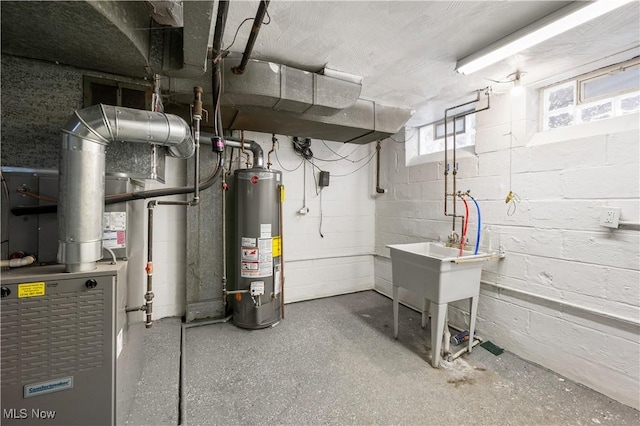2400 Saybrook Rd, University Heights, OH 44118 - basement with gas water heater and concrete block wall