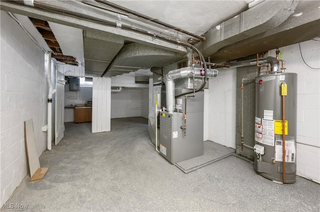 2400 Saybrook Rd, University Heights, OH 44118 - unfinished below grade area featuring water heater, heating unit, and concrete block wall