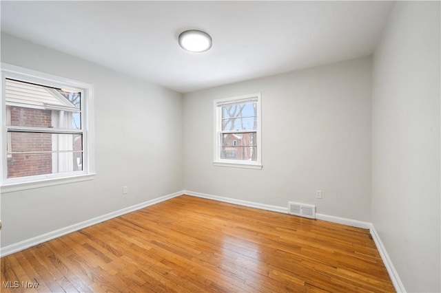 2400 Saybrook Rd, University Heights, OH 44118 - spare room featuring light wood-style flooring and baseboards
