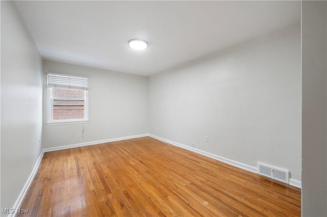 2400 Saybrook Rd, University Heights, OH 44118 - spare room with light wood finished floors and baseboards