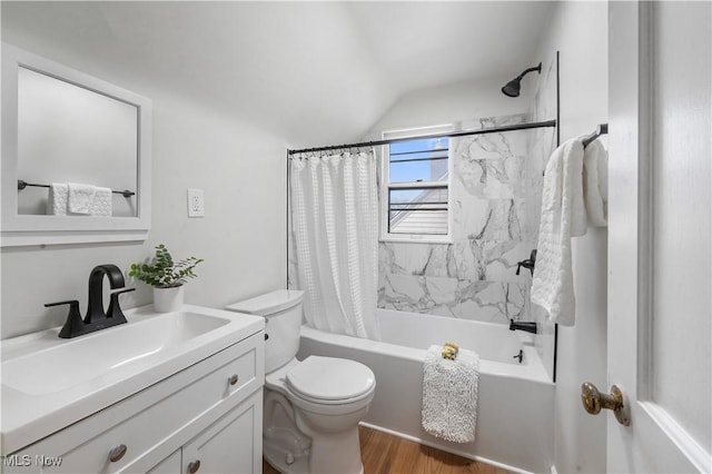 2400 Saybrook Rd, University Heights, OH 44118 - full bathroom with toilet, vanity, shower / tub combo, vaulted ceiling, and wood finished floors