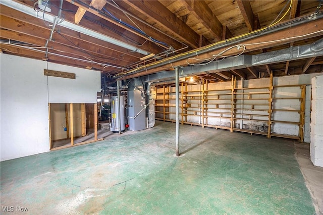 1655 Calder Ridge Rd, Belpre, OH 45714 - unfinished below grade area with heating unit and gas water heater