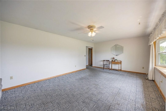 1655 Calder Ridge Rd, Belpre, OH 45714 - carpeted spare room featuring a ceiling fan and baseboards