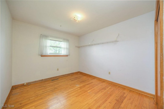 1655 Calder Ridge Rd, Belpre, OH 45714 - empty room featuring hardwood / wood-style floors and baseboards