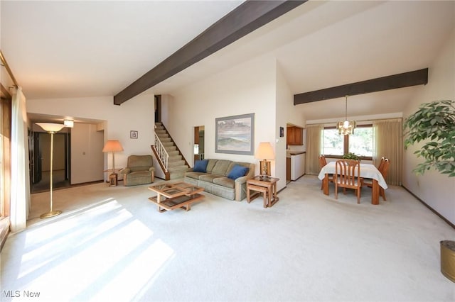 living area with light colored carpet, stairway, and a chandelier