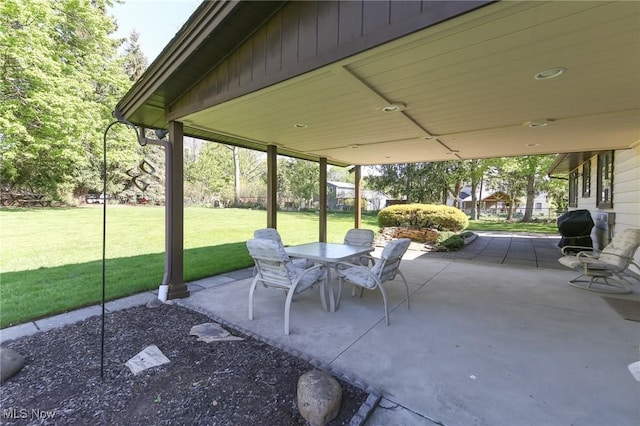 view of patio with outdoor dining area