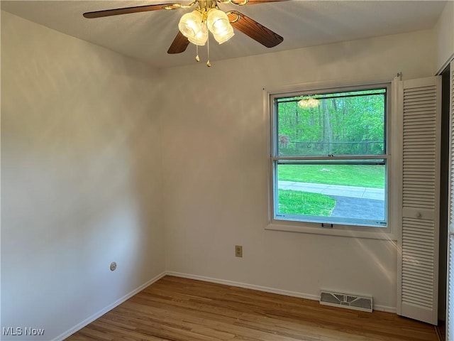 9744 Andrea Dr, Concord, OH 44060 - spare room featuring wood finished floors, ceiling fan, and baseboards