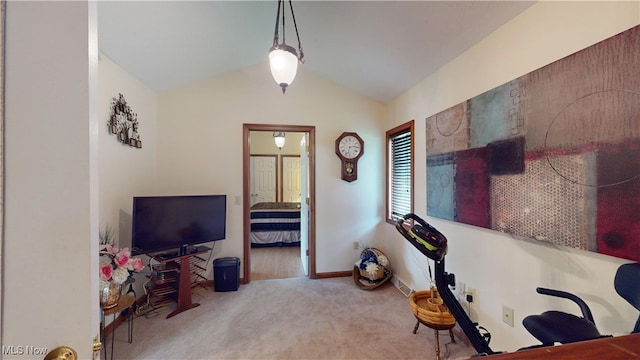 office with vaulted ceiling and carpet