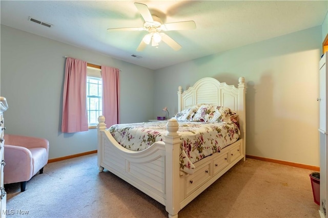 1402 SW Channonbrook St SW, Canton, OH 44710 - bedroom featuring light carpet, baseboards, and a ceiling fan