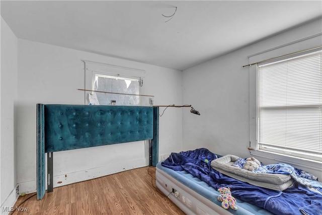 1348 Himrod Ave, Youngstown, OH 44506 - bedroom with wood finished floors and multiple windows