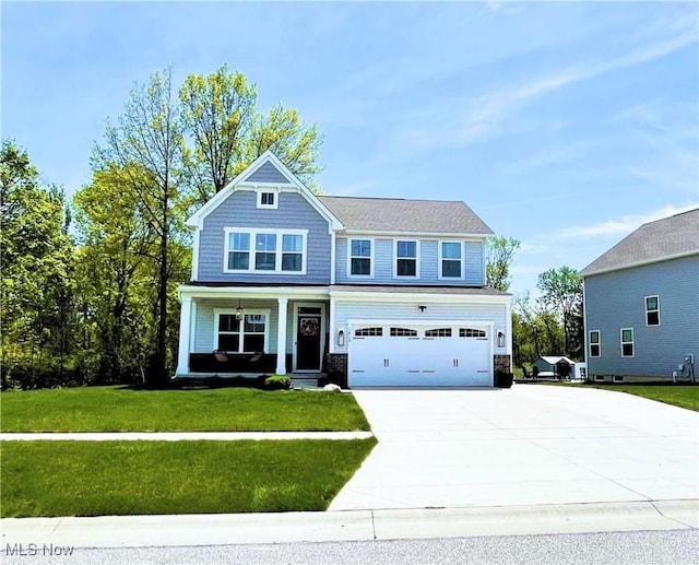 1810 Muirfield Ln, Painesville, OH 44077 - craftsman-style home featuring driveway, a porch, a front lawn, and an attached garage