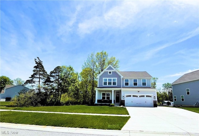 1810 Muirfield Ln, Painesville, OH 44077 - view of front of property featuring driveway, a garage, a front lawn, and a porch