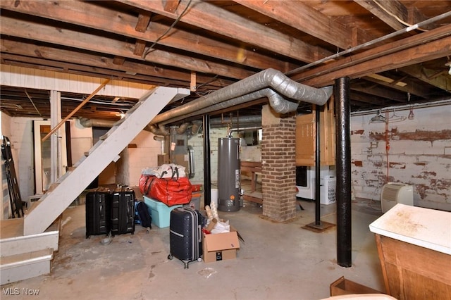 unfinished basement featuring gas water heater