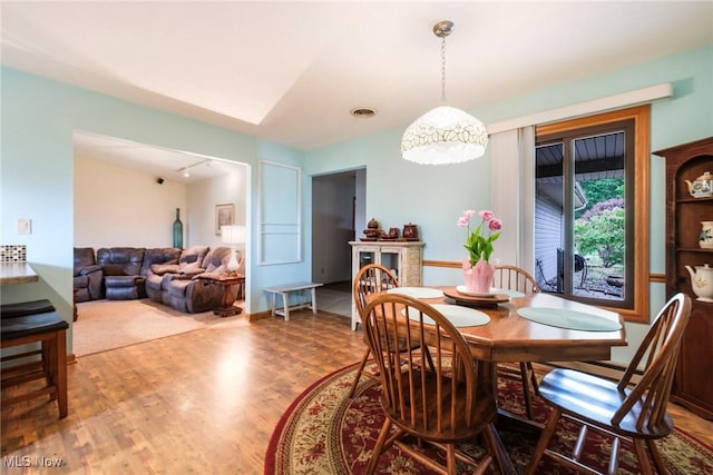 dining area featuring wood finished floors