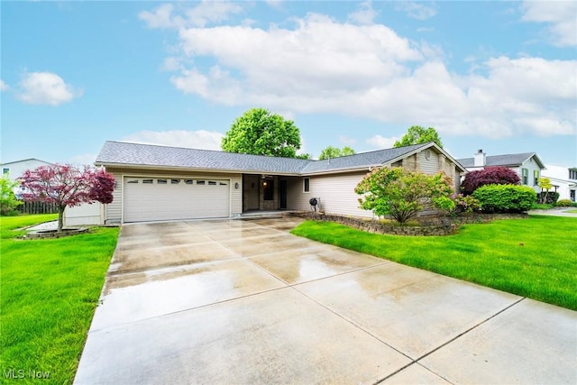 single story home with an attached garage, driveway, and a front lawn