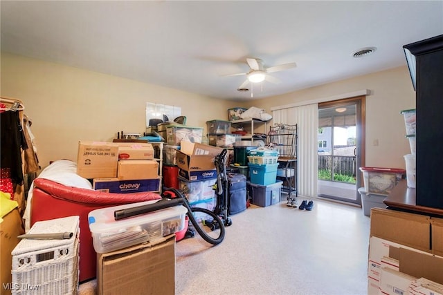storage area featuring a ceiling fan