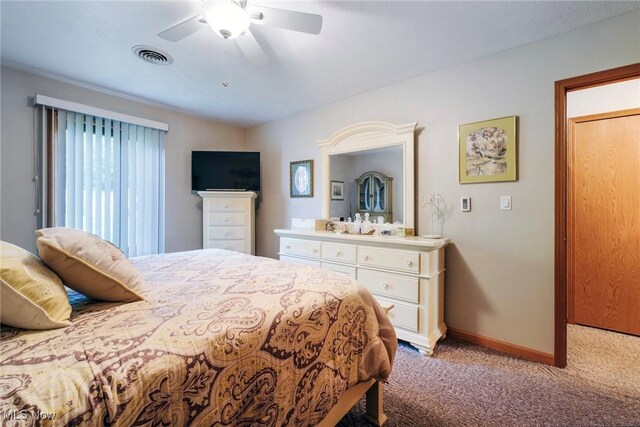 bedroom featuring carpet flooring, baseboards, and a ceiling fan
