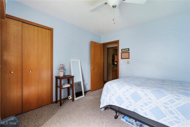 bedroom with light carpet, a closet, and ceiling fan