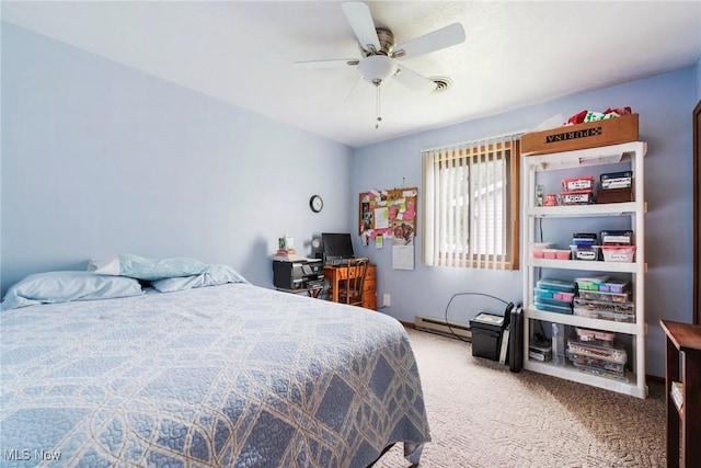 carpeted bedroom featuring a baseboard radiator and a ceiling fan