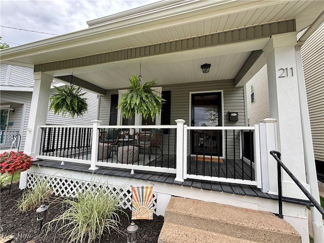 211 Kenwood St, Marietta, OH 45750 - view of exterior entry with a porch