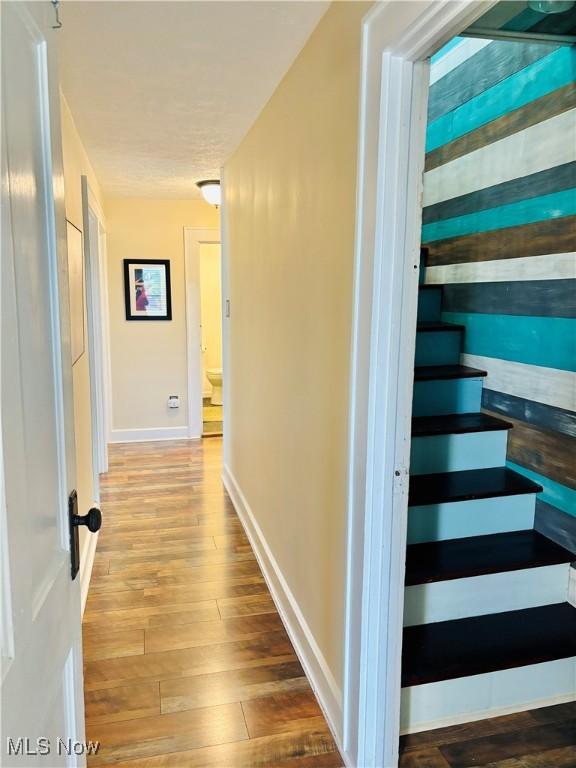 211 Kenwood St, Marietta, OH 45750 - staircase with wood finished floors and baseboards