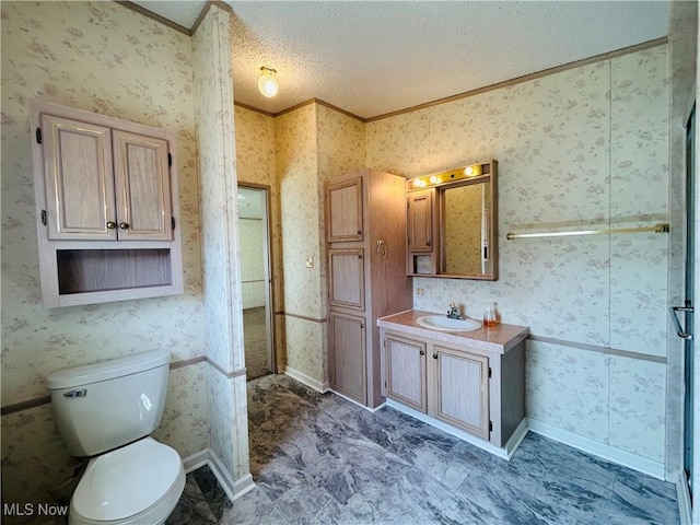 2270 S Commodore Ct, Lakeside-Marblehead, OH 43440 - full bathroom with ornamental molding, a textured ceiling, toilet, vanity, and baseboards