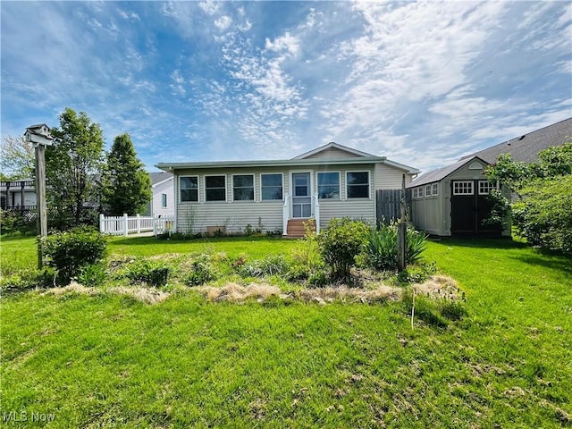 2270 S Commodore Ct, Lakeside-Marblehead, OH 43440 - view of front of house with a storage unit, entry steps, and an outbuilding