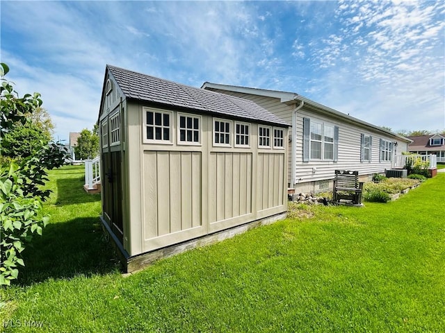 2270 S Commodore Ct, Lakeside-Marblehead, OH 43440 - back of property featuring a yard and cooling unit