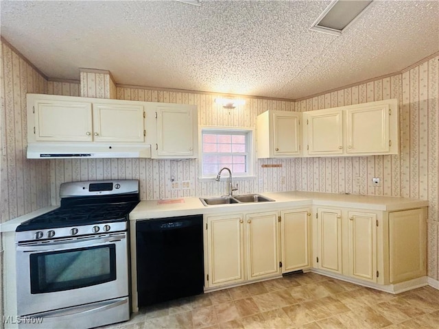 2270 S Commodore Ct, Lakeside-Marblehead, OH 43440 - kitchen featuring stainless steel gas range, black dishwasher, a sink, under cabinet range hood, and light countertops