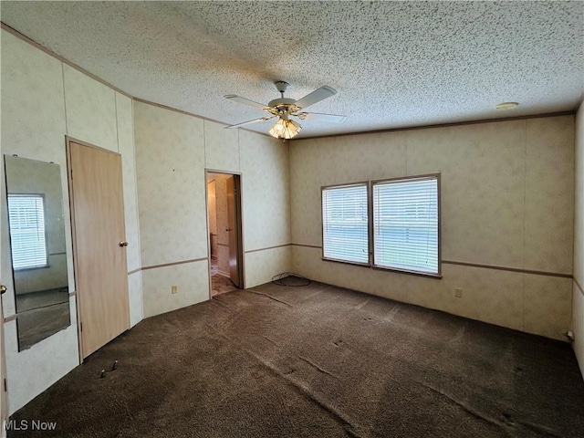 2270 S Commodore Ct, Lakeside-Marblehead, OH 43440 - spare room with carpet, a ceiling fan, and a textured ceiling