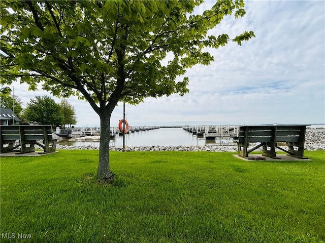 2270 S Commodore Ct, Lakeside-Marblehead, OH 43440 - view of grassy yard featuring a water view and a dock