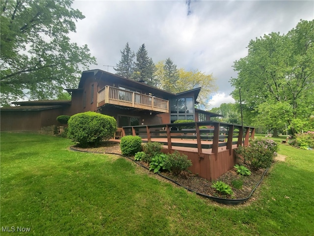 9651 Skyway Dr, Wadsworth, OH 44281 - rear view of house featuring a yard and a wooden deck