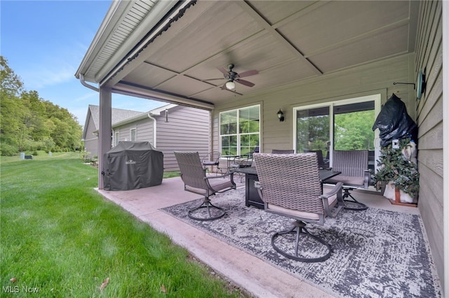 view of patio / terrace with a ceiling fan and a grill