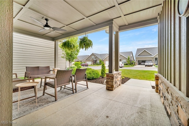 view of patio featuring a residential view and ceiling fan