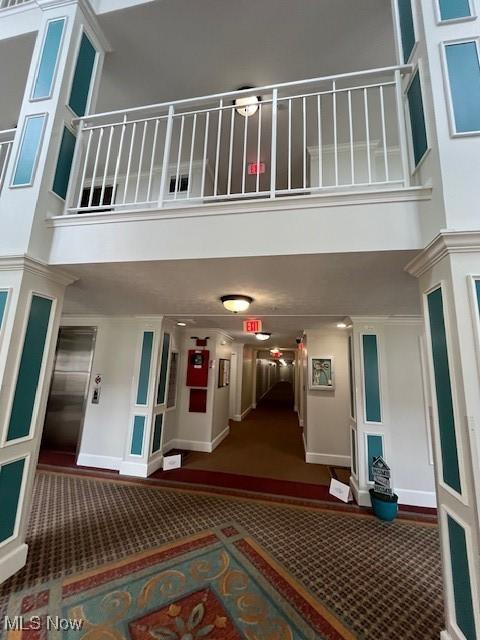 23003 Chandlers Ln Unit 219, Olmsted Falls, OH 44138 - common area with a towering ceiling