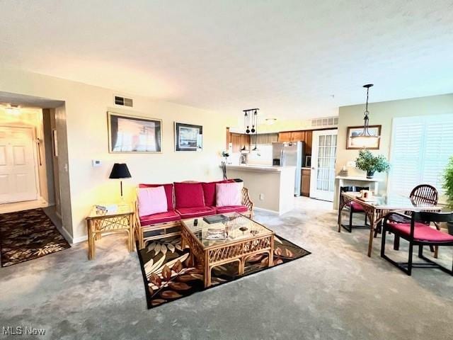23003 Chandlers Ln Unit 219, Olmsted Falls, OH 44138 - living room featuring light colored carpet and baseboards