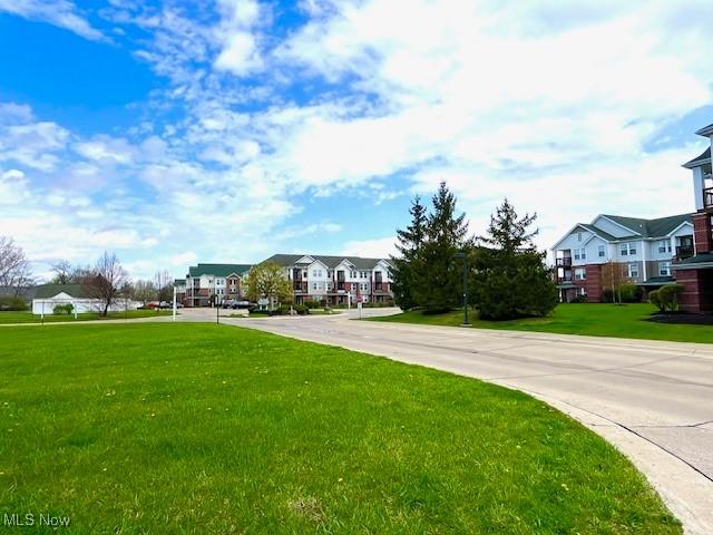 23003 Chandlers Ln Unit 219, Olmsted Falls, OH 44138 - view of home's community featuring a residential view and a yard