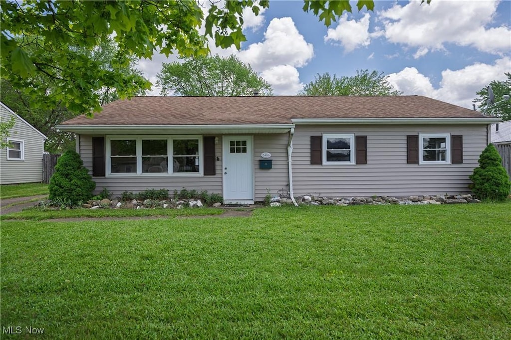 2406 Martha Ave NE, Canton, OH 44705 - single story home with a front lawn