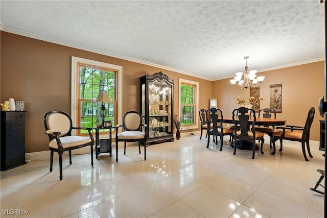 dining room featuring crown molding, light tile patterned floors, baseboards, a chandelier, and a textured ceiling