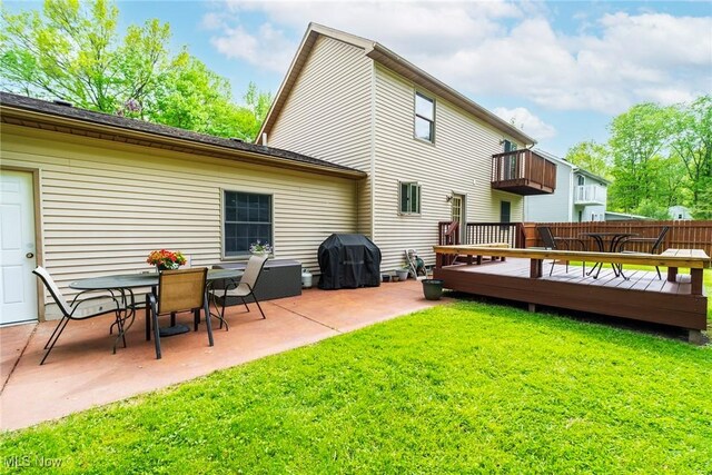 17466 Idylwild Ave, Lake Milton, OH 44429 - rear view of property featuring a patio and a wooden deck