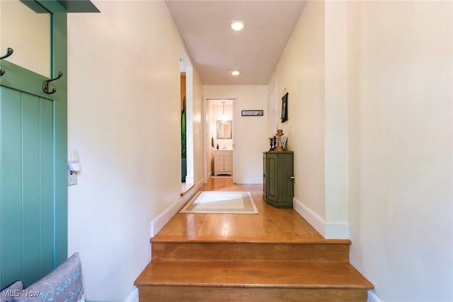 17466 Idylwild Ave, Lake Milton, OH 44429 - stairs featuring wood finished floors, recessed lighting, and baseboards