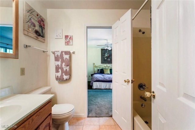 17466 Idylwild Ave, Lake Milton, OH 44429 - ensuite bathroom featuring vanity, shower / washtub combination, tile patterned flooring, toilet, and ceiling fan