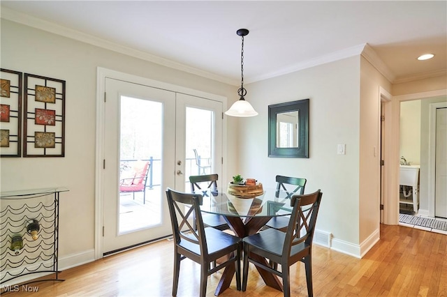 7304 Glastonbury Dr, Hudson, OH 44236 - dining room featuring baseboards, light wood-style flooring, french doors, crown molding, and recessed lighting