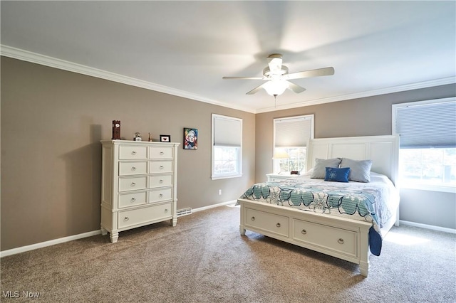 7304 Glastonbury Dr, Hudson, OH 44236 - bedroom with multiple windows, carpet flooring, crown molding, and baseboards