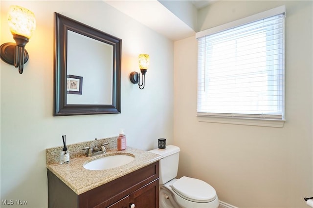 7304 Glastonbury Dr, Hudson, OH 44236 - bathroom featuring vanity, healthy amount of natural light, and toilet