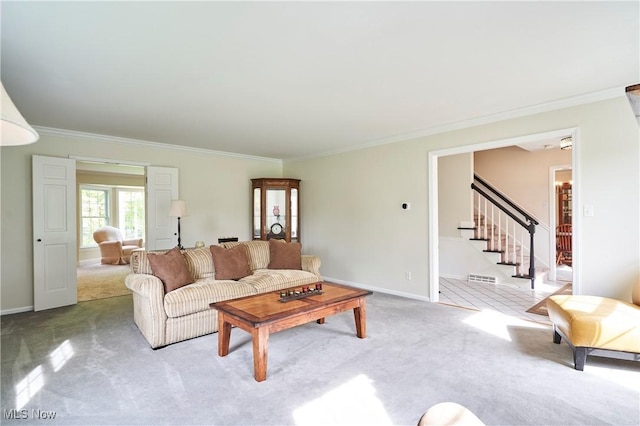 7304 Glastonbury Dr, Hudson, OH 44236 - living room with carpet floors, ornamental molding, stairs, and baseboards